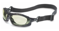 A pair of Honeywell Uvex Sealed Safety Eyewear against white.