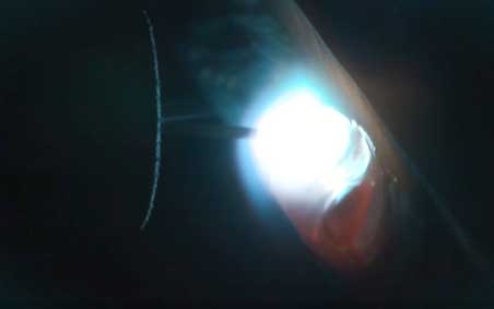 A close-up of an arc welding puddle