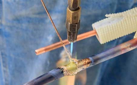 Oxy-fuel welding a copper tube