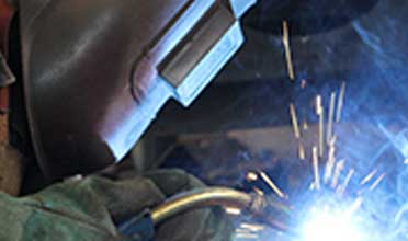 Welder using MIG equipment